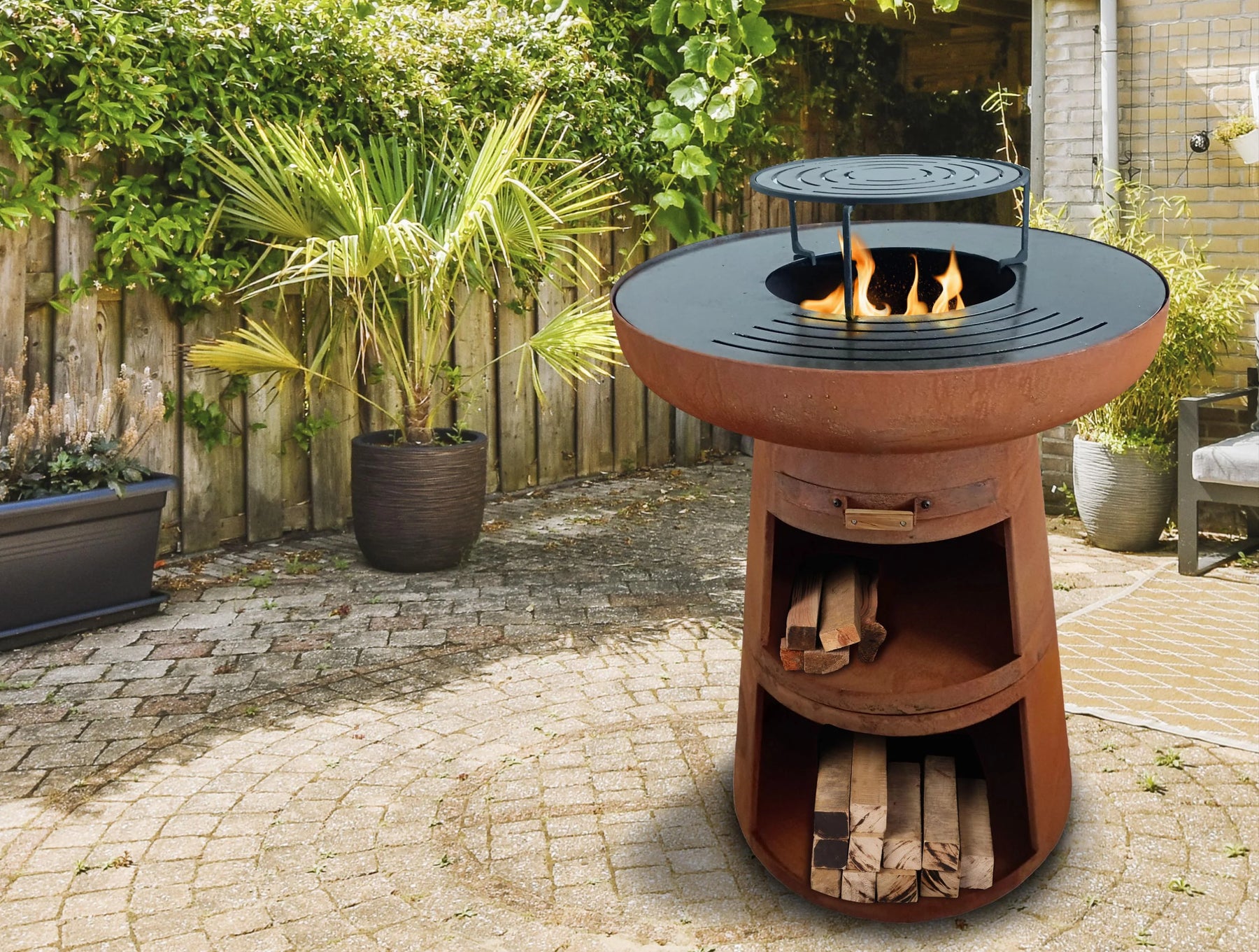Round barbecue with round steel plate and corten steel grill -